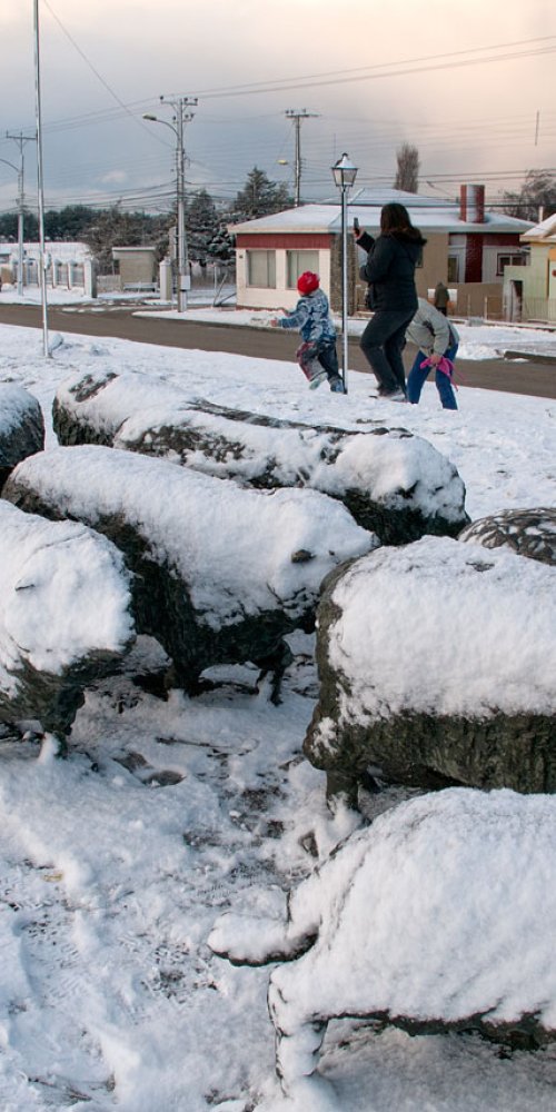 Local street in Punta Arenas with cyclists